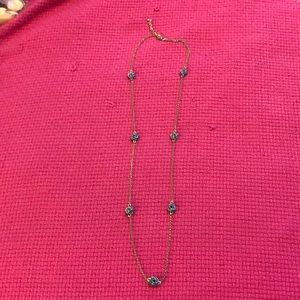 Gold long necklace with blue love knots